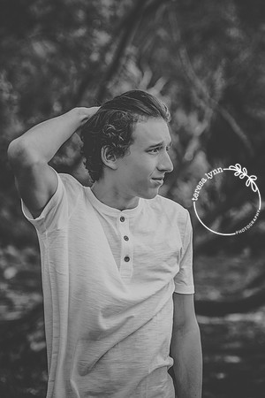 b/w senior boy long hair